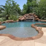 Pool_with_Large_Beach_Entry_and_Weeping_Rocks_and_Slide-11